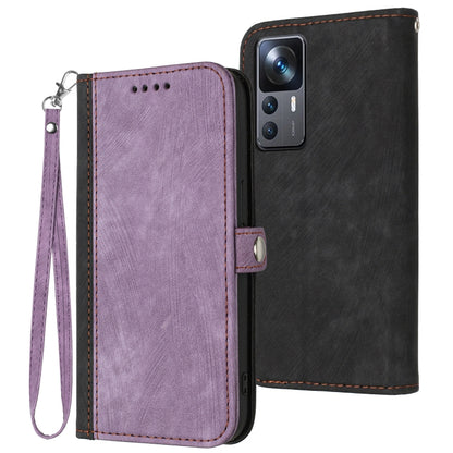 Purple leather phone case folio with side buckle, double-fold design, wrist strap.