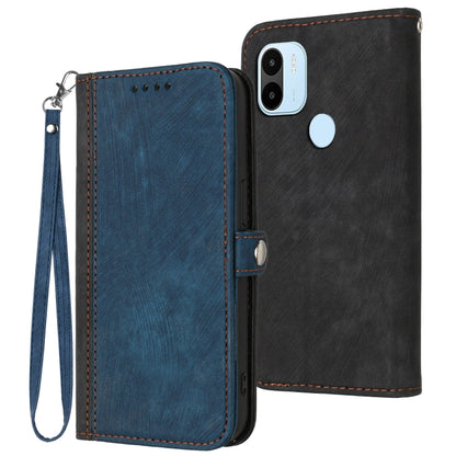 Blue leather flip wallet phone case with wrist strap and camera cutout, dark outer shell