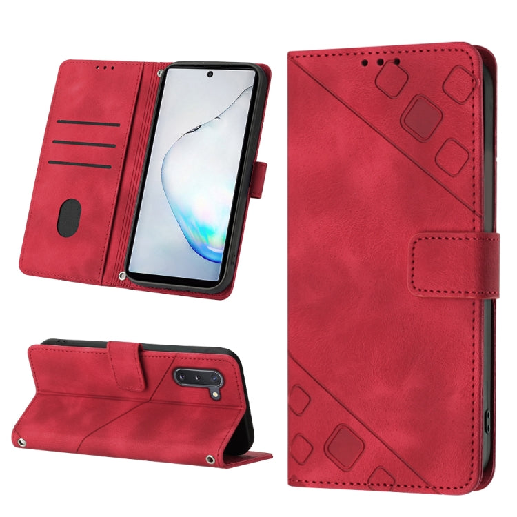 Red embossed leather phone case with card slots, stitched edges, and fold-out stand.