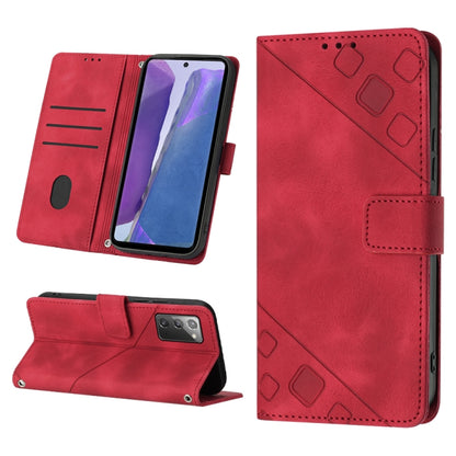Red embossed leather folio phone case with geometric embossed front and wallet closure strap.