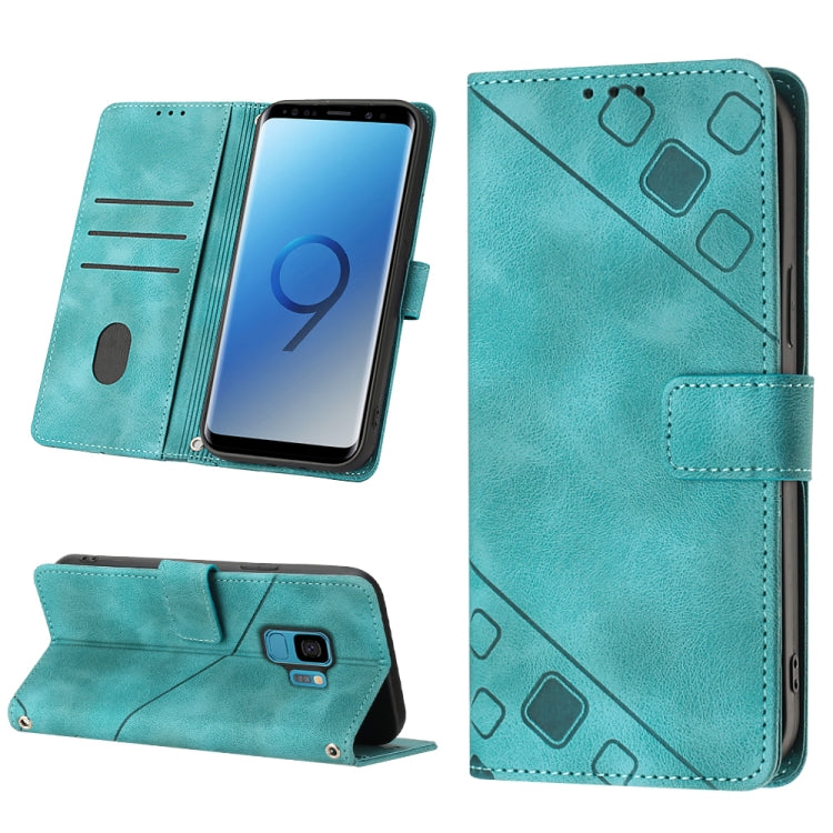 Turquoise embossed leather folio phone case, front and back with strap closure