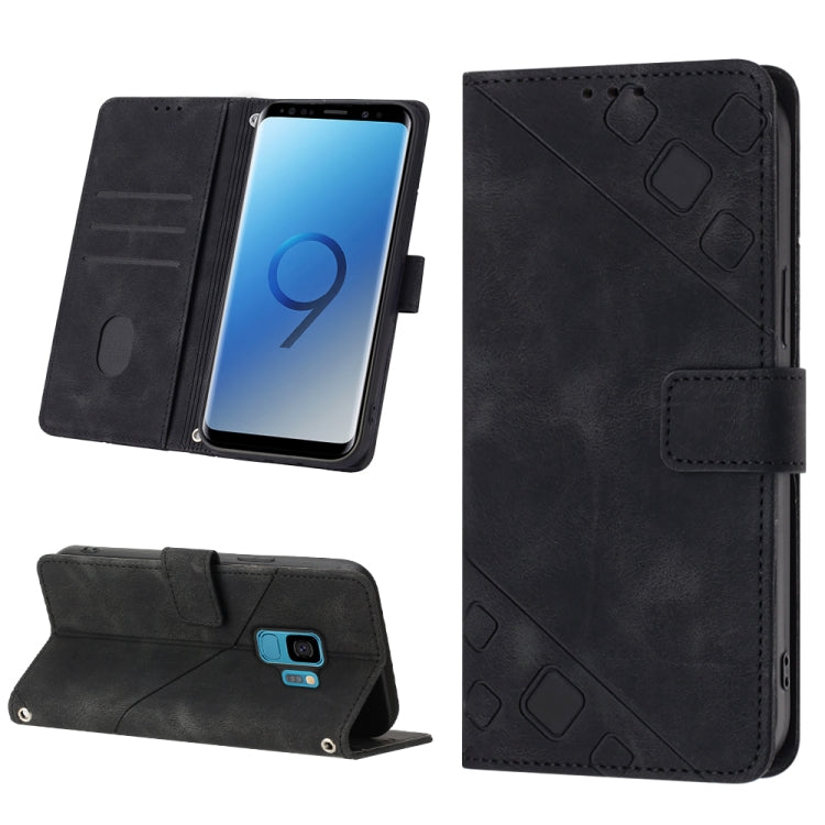 Black embossed leather phone case with folio stand and card slot