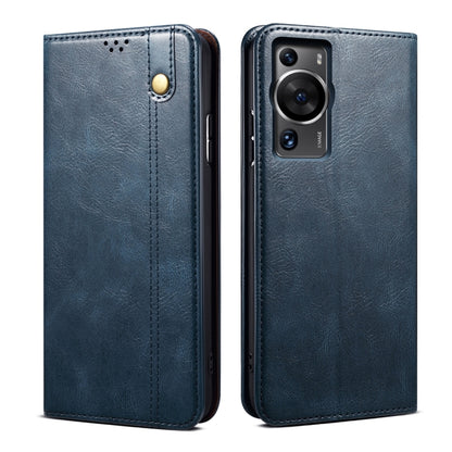 Blue crazy horse leather phone case with snap closure, stitched seam, camera opening