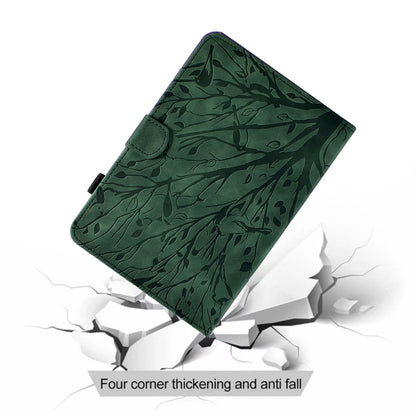 Green leaf-pattern tablet case with corner protection and foldable stand support.