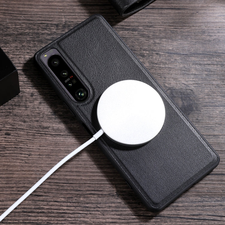 Black textured PU phone case with MagSafe magnetic card holder and attached cable
