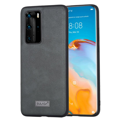 Black protective phone case with textured leather back, camera cutouts, SULADA badge.