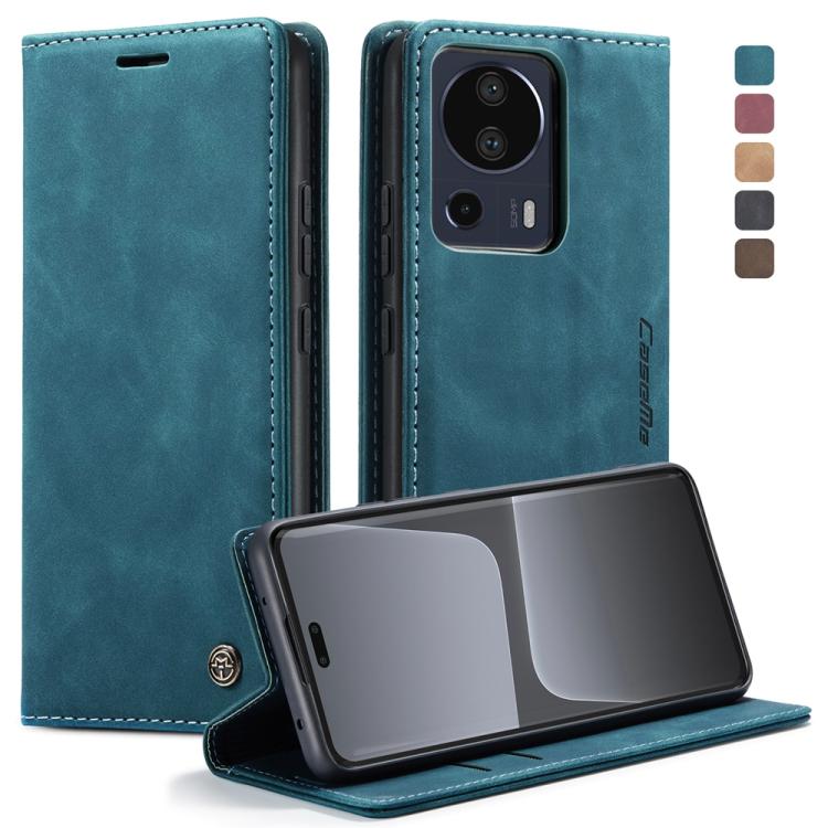 Teal leather flip phone case with stitched edges and viewing stand at bottom