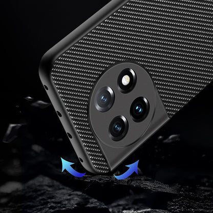 Carbon fiber textured phone case with raised camera cutout and grippy bumper corners, black.