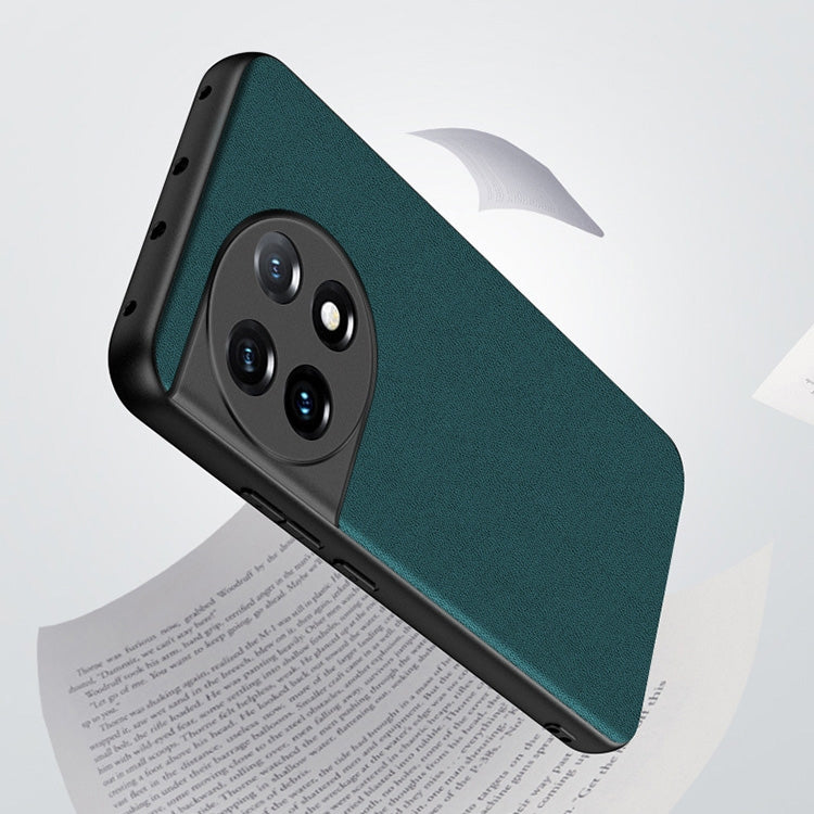 Teal lambskin leather phone case for OnePlus 11, textured leather, side buttons, camera cutouts.
