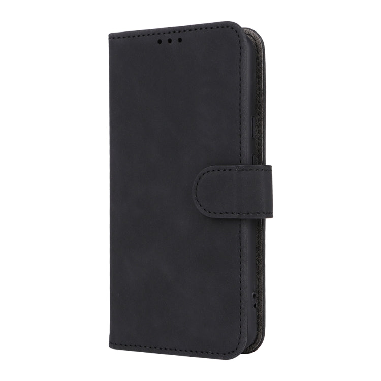 Black magnetic flip leather phone case with side cover flap and snap closure.