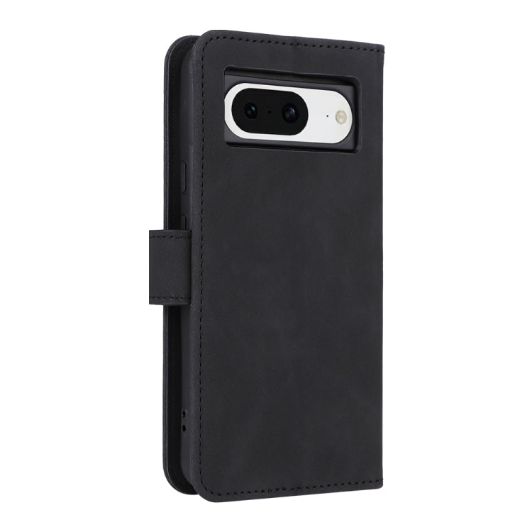 Black magnetic flip leather phone case showing camera opening and side strap.