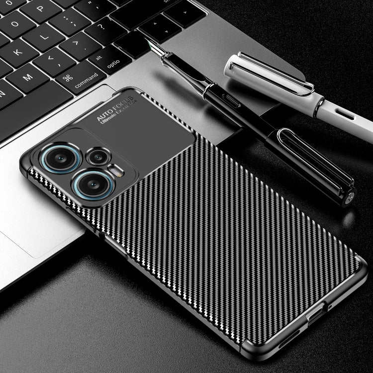 Carbon fiber TPU phone case with triple camera cutout and slim bumper frame