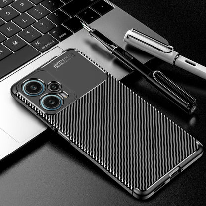 Carbon fiber TPU phone case with triple camera cutout and slim bumper frame