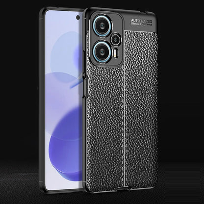 Black litchi-texture shockproof TPU phone case with side button cutouts