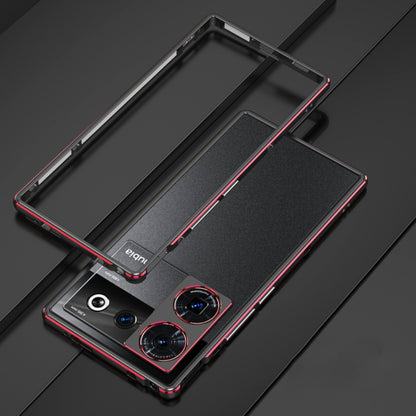 Black metal frame phone case with lens cover flap, red trim, raised camera protection