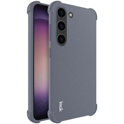 Matte grey shockproof TPU phone case with raised edges and triple camera cutouts