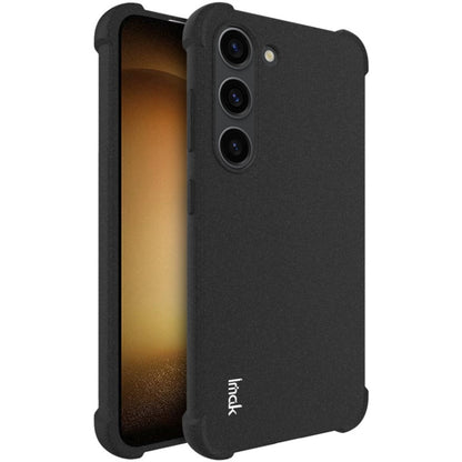 Matte black shockproof TPU phone case with triple camera cutouts and side grips