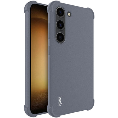Matte grey shockproof TPU phone case with triple camera cutouts and rugged corners