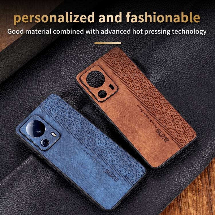 Phone cases with 3D embossed textures in blue and brown, showing camera cutouts