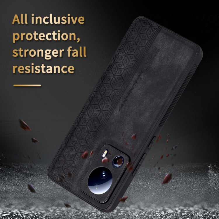 Dark gray phone case with 3D embossed pattern and camera cutouts for fall protection
