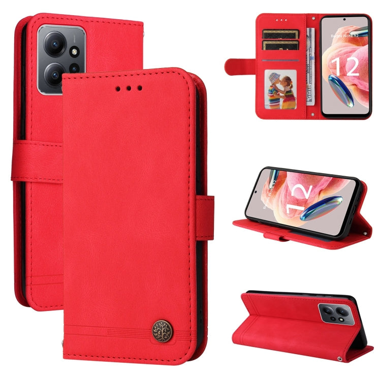 Red leather folio phone case with metal button, card slots and flip stand