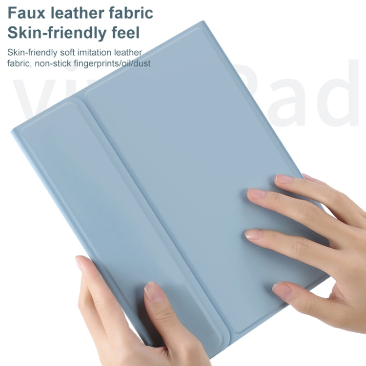 Blue leather-look tablet case cover with soft texture, hands holding it closed