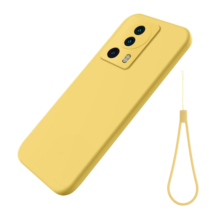 Yellow silicone shockproof phone case with camera cutouts and matching lanyard strap.