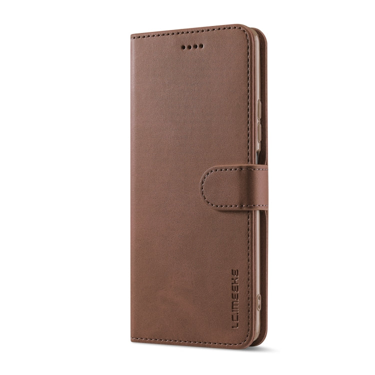Brown flip wallet phone case with stitched card holder and side cutouts