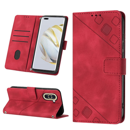 Red embossed leather flip phone case with strap closure, card slots, and phone stand