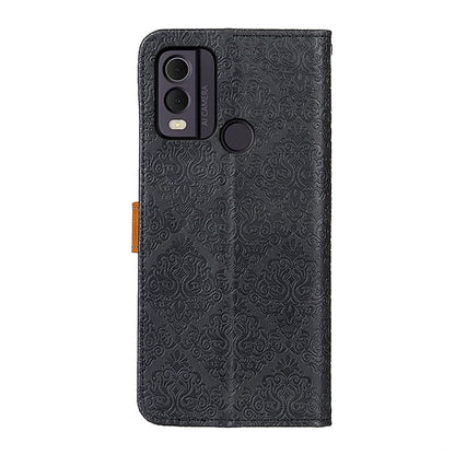 Black embossed flip leather phone case with floral pattern and camera cutouts