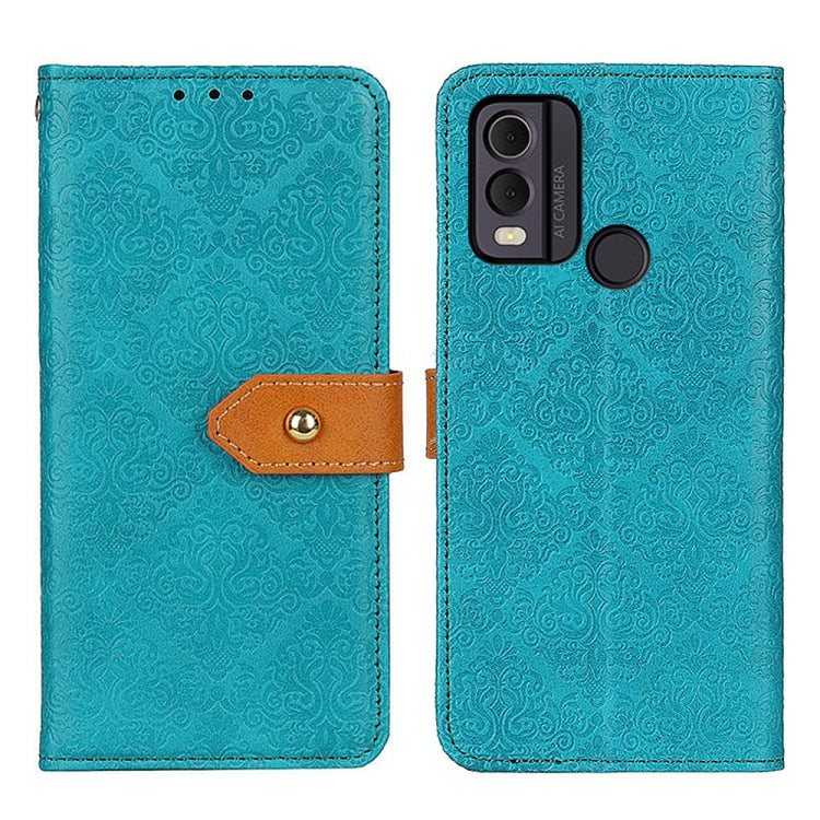Blue floral embossed flip leather phone case with magnetic clasp and camera cutout