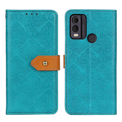 Blue floral embossed flip leather phone case with magnetic clasp and camera cutout