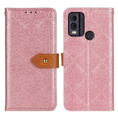 Pink embossed floral flip leather phone case with brown strap and magnetic closure