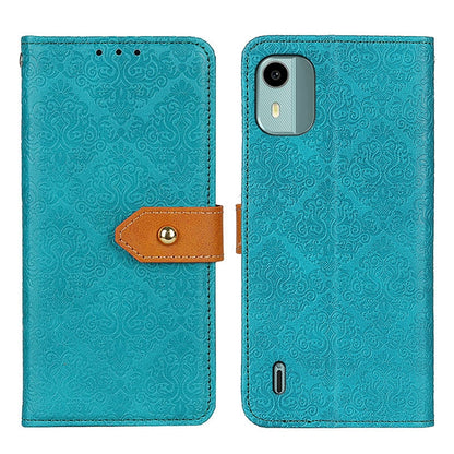 Blue floral embossed flip leather phone case with magnetic strap, camera cutout