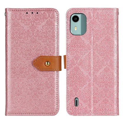 Pink embossed floral flip leather phone case with camera cutout and brown side strap