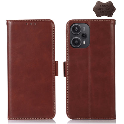 Brown leather flip phone case with side strap and camera cutout