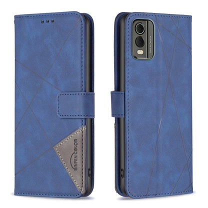 Blue leather flip phone case with rhombus texture and magnetic buckle closure