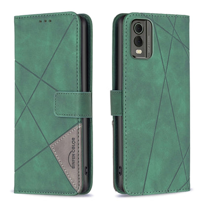 Green leather flip phone case with rhombus texture and magnetic buckle closure