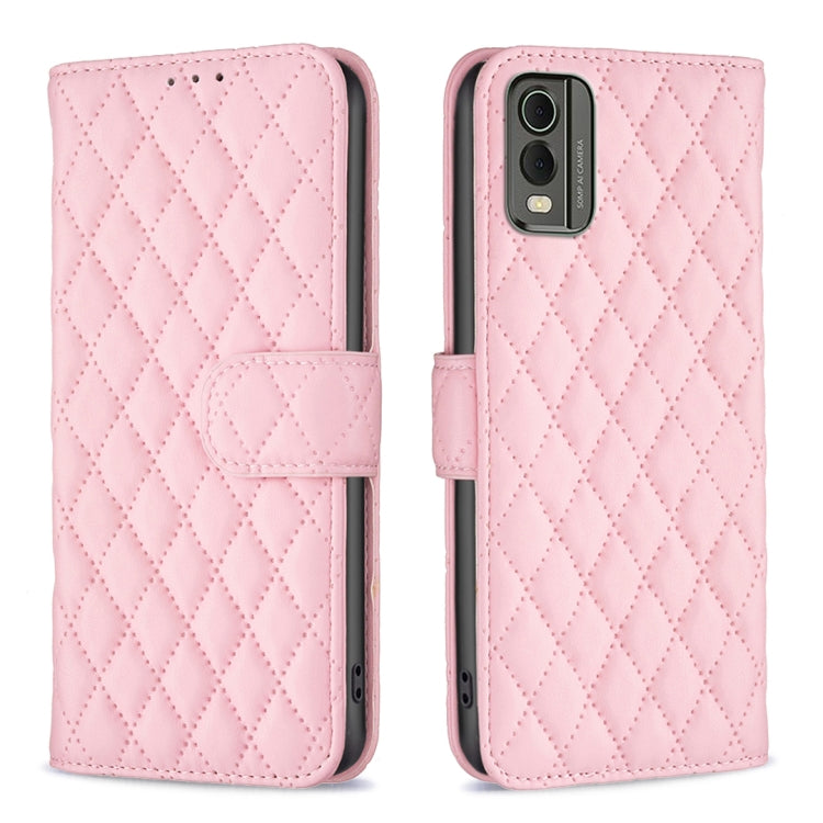 Pink diamond-lattice wallet flip phone case with folio strap and camera cutout