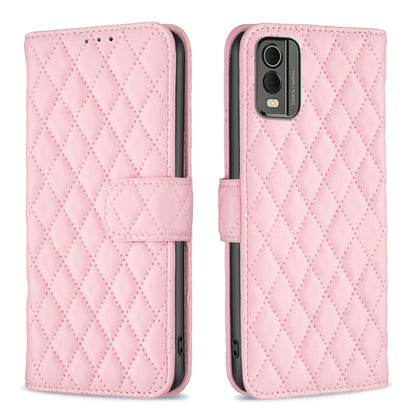 Pink diamond-lattice wallet flip phone case with folio strap and camera cutout
