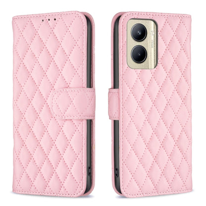 Light pink diamond-lattice wallet flip phone case with folio strap and camera cutout