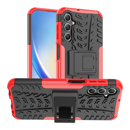 Red tire-texture TPU phone case with PC back, triple-camera cutouts, and stand holder