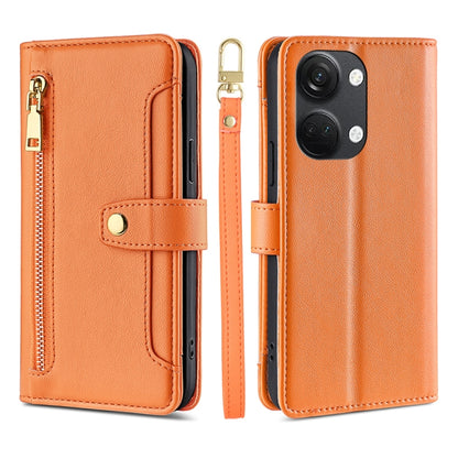 Orange leather cross-body wallet phone case with zipper and snap strap