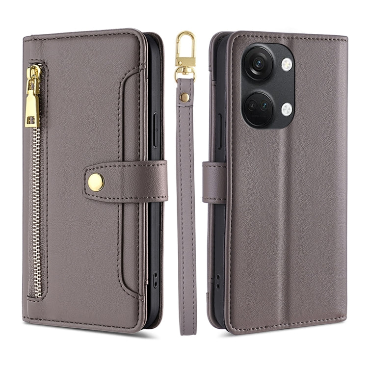 Grey leather cross-body wallet phone case with zipper and magnetic snap strap