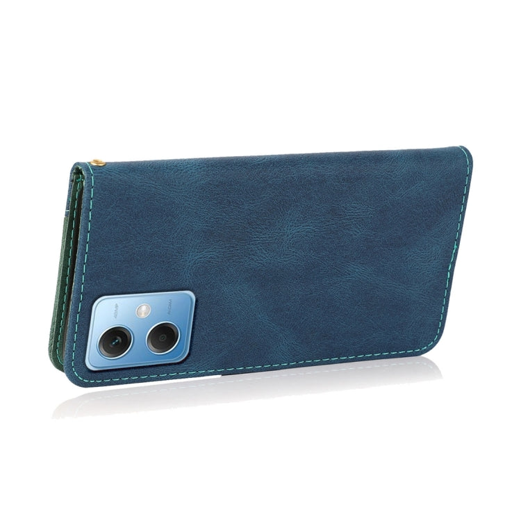 Blue leather phone case with green stitching and camera cutout, slim flip design