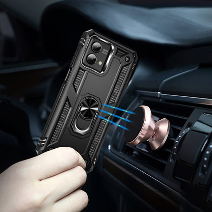 Black rugged phone case with metal ring holder attached to a car air vent