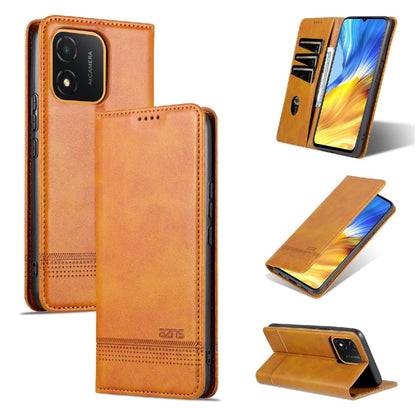 Tan leather flip phone case with magnetic closure, stitched trim, and stand