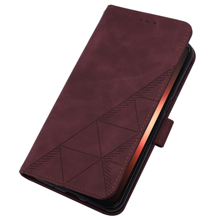 Wine red embossed flip leather phone case with textured geometric panel