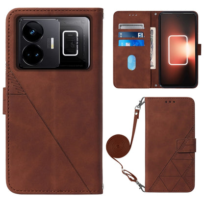 Crossbody flip leather phone case in brown with embossed diamond pattern and wrist strap