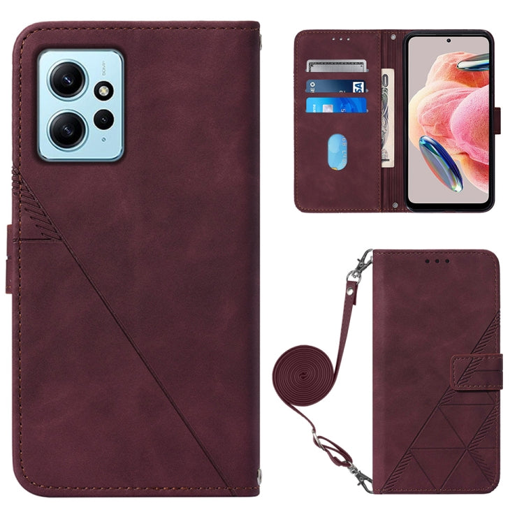 Wine red leather flip phone case with card slots, geometric emboss, and crossbody strap.